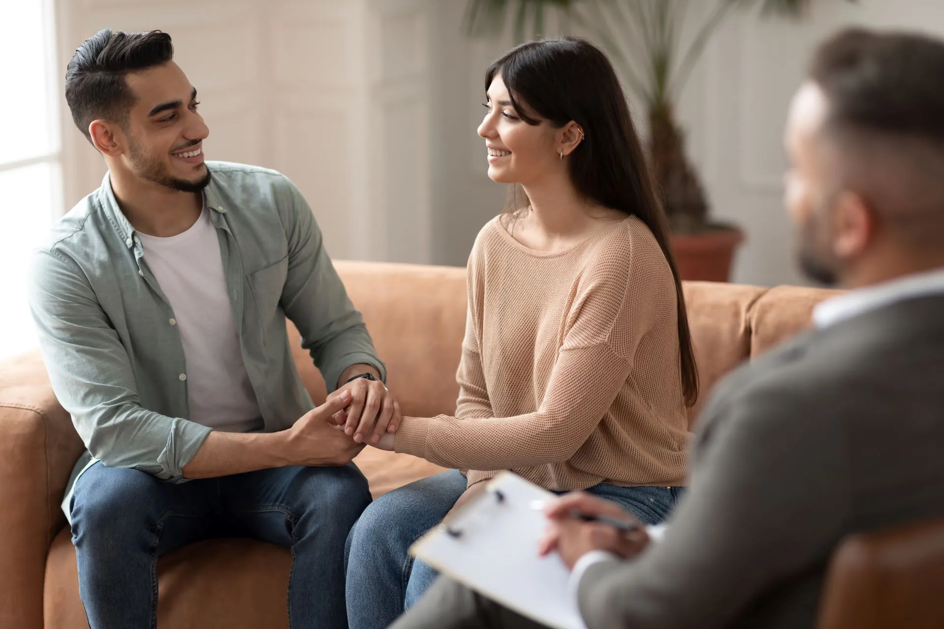 A couple talking openly during a relationship consultation